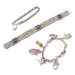 A silver bracelet with padlock clasp,
