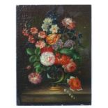 XX, Continental School, Oil on panel, Flowers in a glass gilt urn on a marble slab.