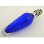 A 21stC blue glass scent/perfume bottle,