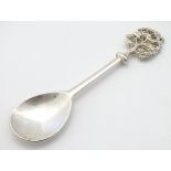 A John Cussell Wodland Trust silver spoon, hallmarked London 1997,