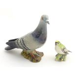 Two Beswick models of birds, comprising a pigeon, model no. 1383, and a goldcrest, model no. 2415.