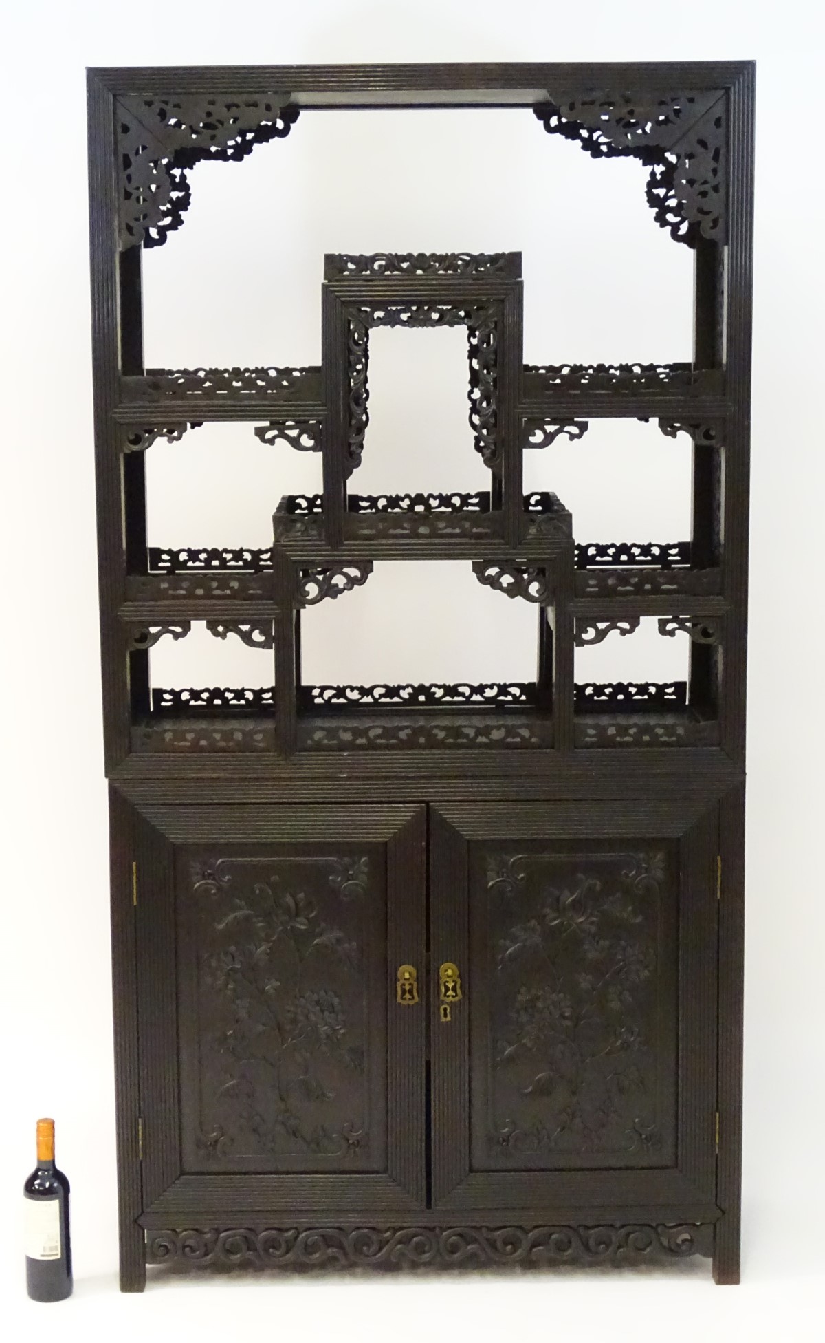 A late 19thC / early 20thC Chinese hardwood cabinet with open display shelves resting on a cupboard - Image 8 of 10