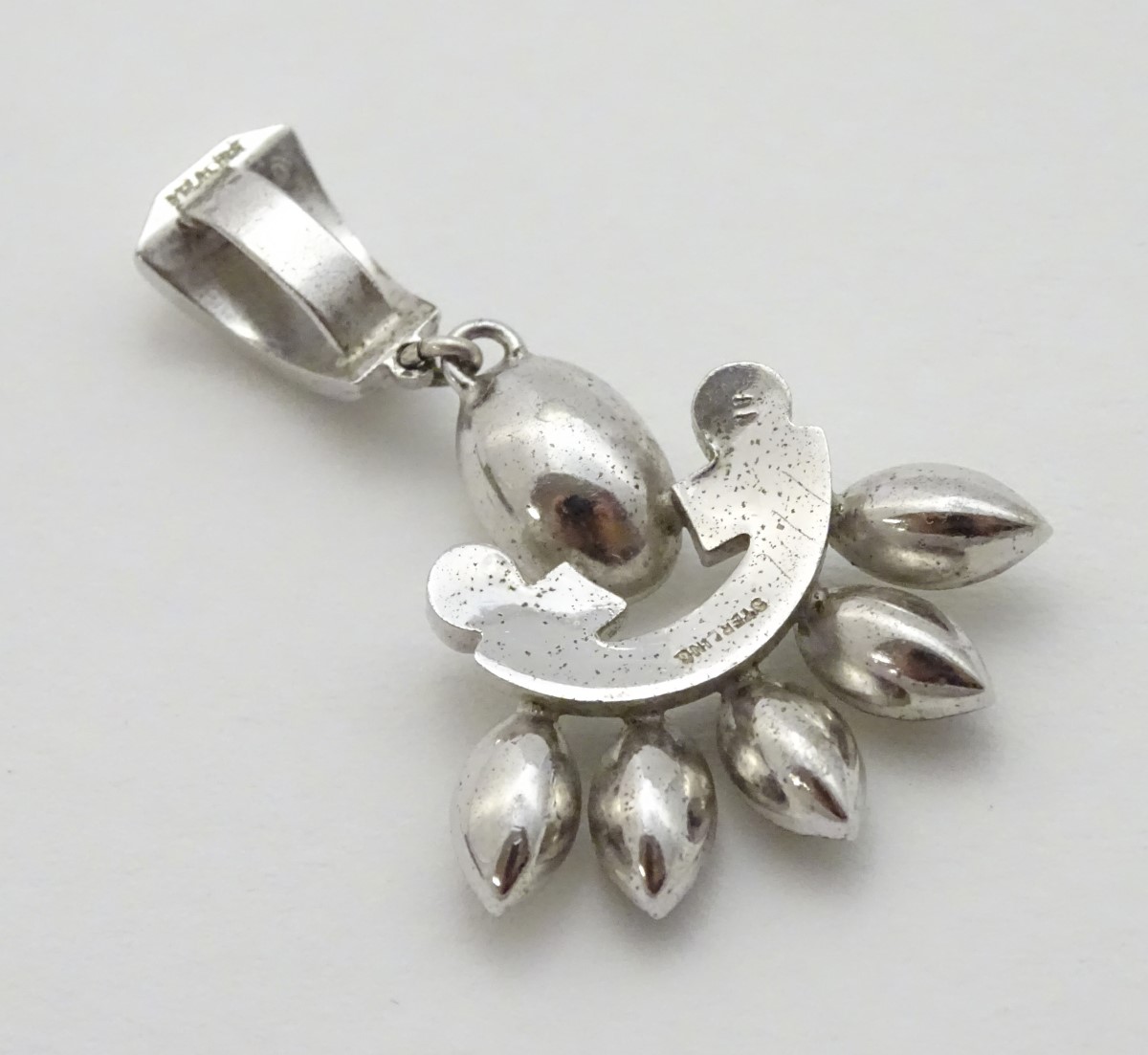 A white metal pendant set with paste stones 1 3/54" long CONDITION: Please Note - - Image 8 of 9