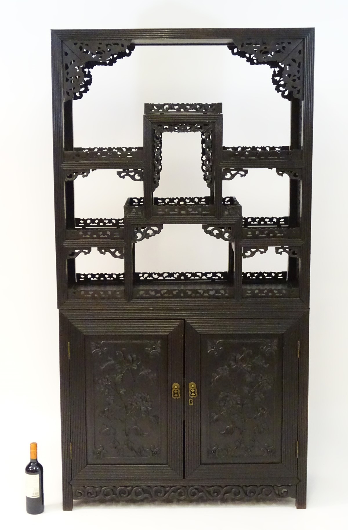 A late 19thC / early 20thC Chinese hardwood cabinet with open display shelves resting on a cupboard - Image 9 of 10