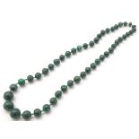 A vintage necklace of graduated malachite beads.