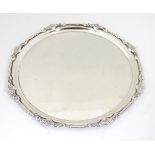 A silver visiting card tray hallmarked Birmingham 1913 maker Adie Bros 8 1/2" diameter (378g)