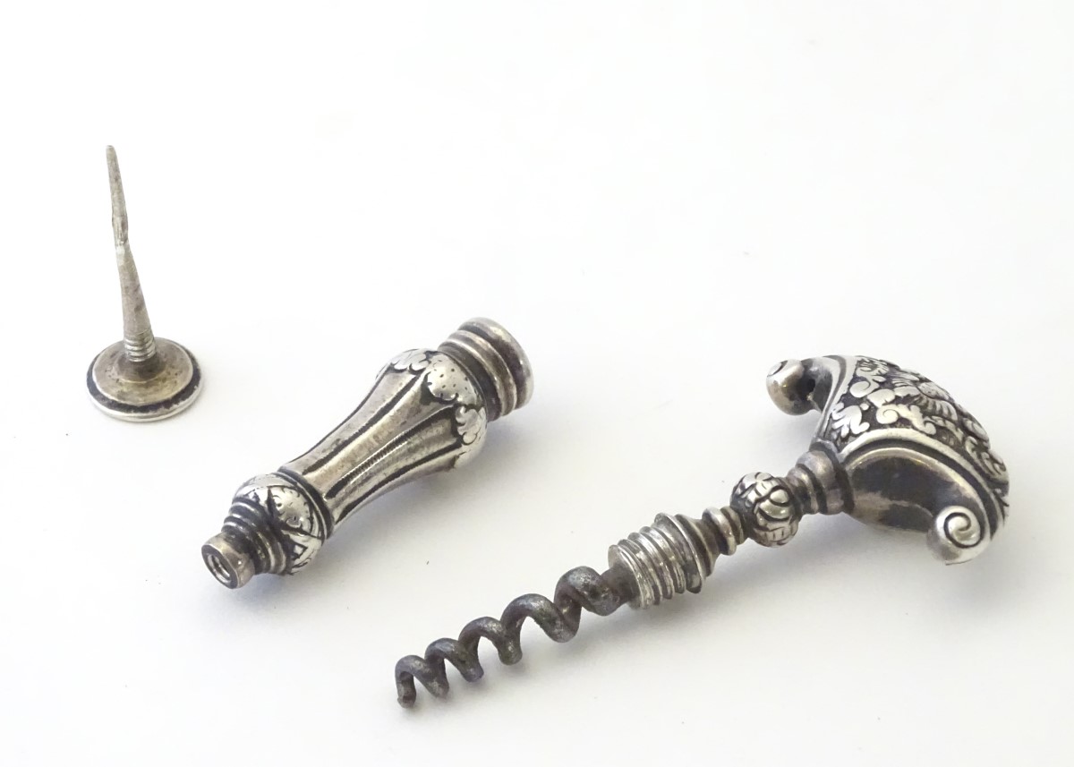 Corkscew : A 18thC Dutch white metal ( silver) corkscrew with shaped handle having acanthus - Image 9 of 10