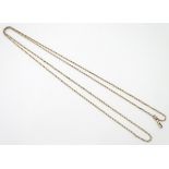 A 9ct gold long guard / watch chain 60" long CONDITION: Please Note - we do not