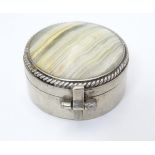 A silver plate box of circular form set with agate / onyx hardstone to lid.