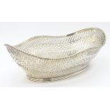 A silver plated cake basket with banded fretwork decoration. Approx. 12" wide.