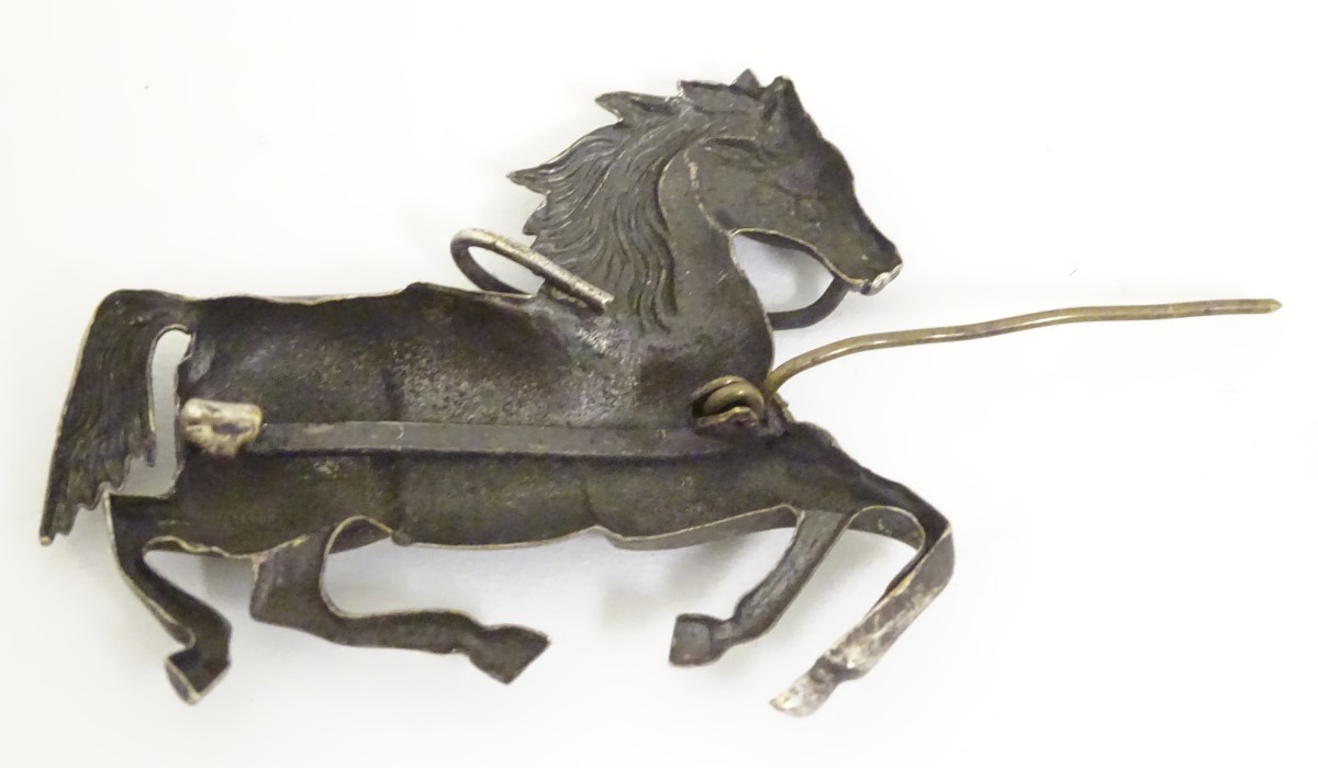 Equine Interest : A white metal brooch formed as a galloping horse. - Image 2 of 10