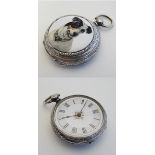 A ladies hallmarked silver pocket watch with later applied ceramic cabochon decorated with head of