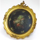 A 19thC circular tole peint tray, the centre painted with fern,