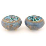 A pair of Oriental plique a jour cloisonne enamel bowls,