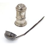 A silver sugar shaker / caster / mufineer of cylindrical form with domed top.