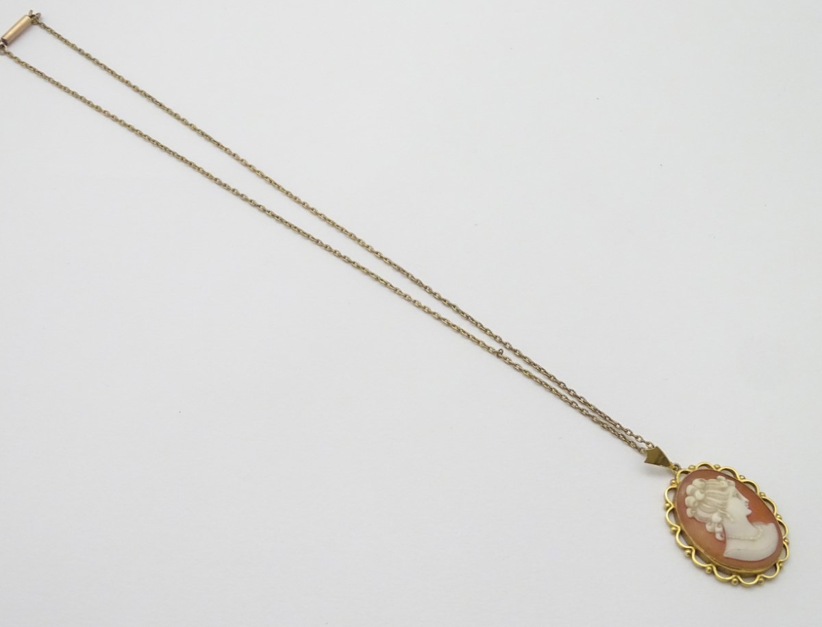 A 9ct gold cameo pendant on a gilt metal chain. - Image 4 of 5