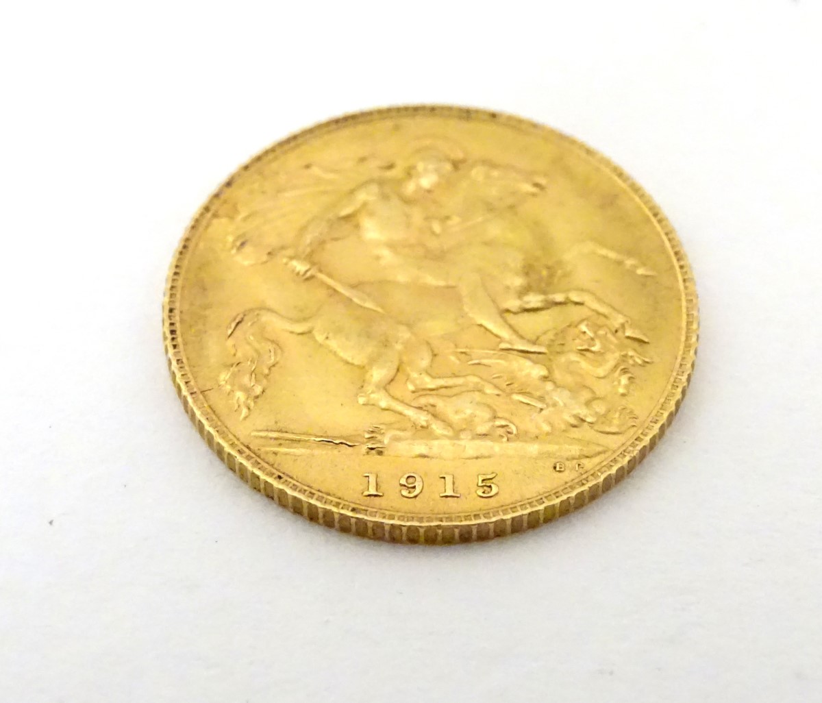 Coin: a 1915 half sovereign, - Image 2 of 3
