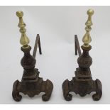Fire dogs: a pair of late 20thC cast iron Andirons / Firedogs,