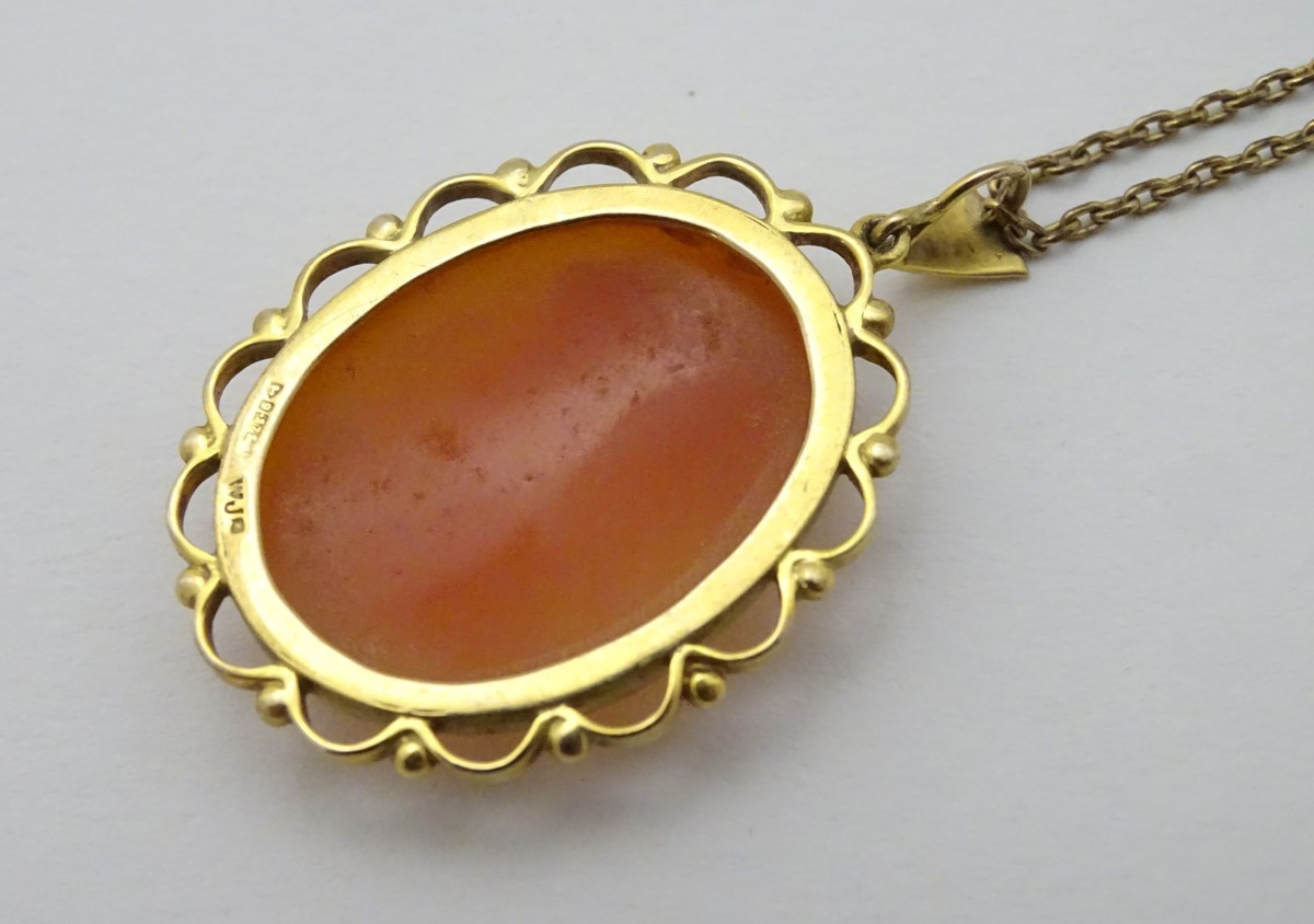 A 9ct gold cameo pendant on a gilt metal chain. - Image 2 of 5