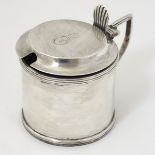 A silver mustard pot hallmarked Birmingham 1912 maker William Hutton & Sons ltd Approx 2" high