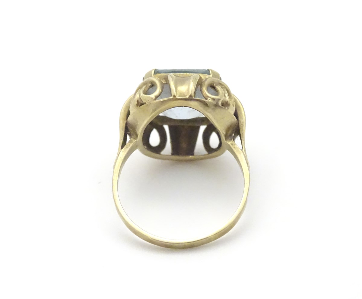 An 8ct (333) gold ring set with large white stone to top. - Image 5 of 5