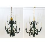 Light Fittings: A pair of 20thC electroliers with dark green painted finish and gilt highlights.