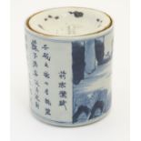 A 19thC Chinese blue and white lidded pot / biscuit barrel decorated with Chinese script and a
