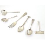 Assorted silver items comprising A picture back teaspoon with handle decorated with Neptune /