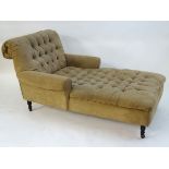 A late 20thC daybed / chaise lounge with deep buttoned upholstery,
