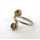 A silver ring set with amber cabochon CONDITION: Please Note - we do not make
