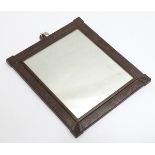 An Art Deco Bakelite frame with mirror. Approx.