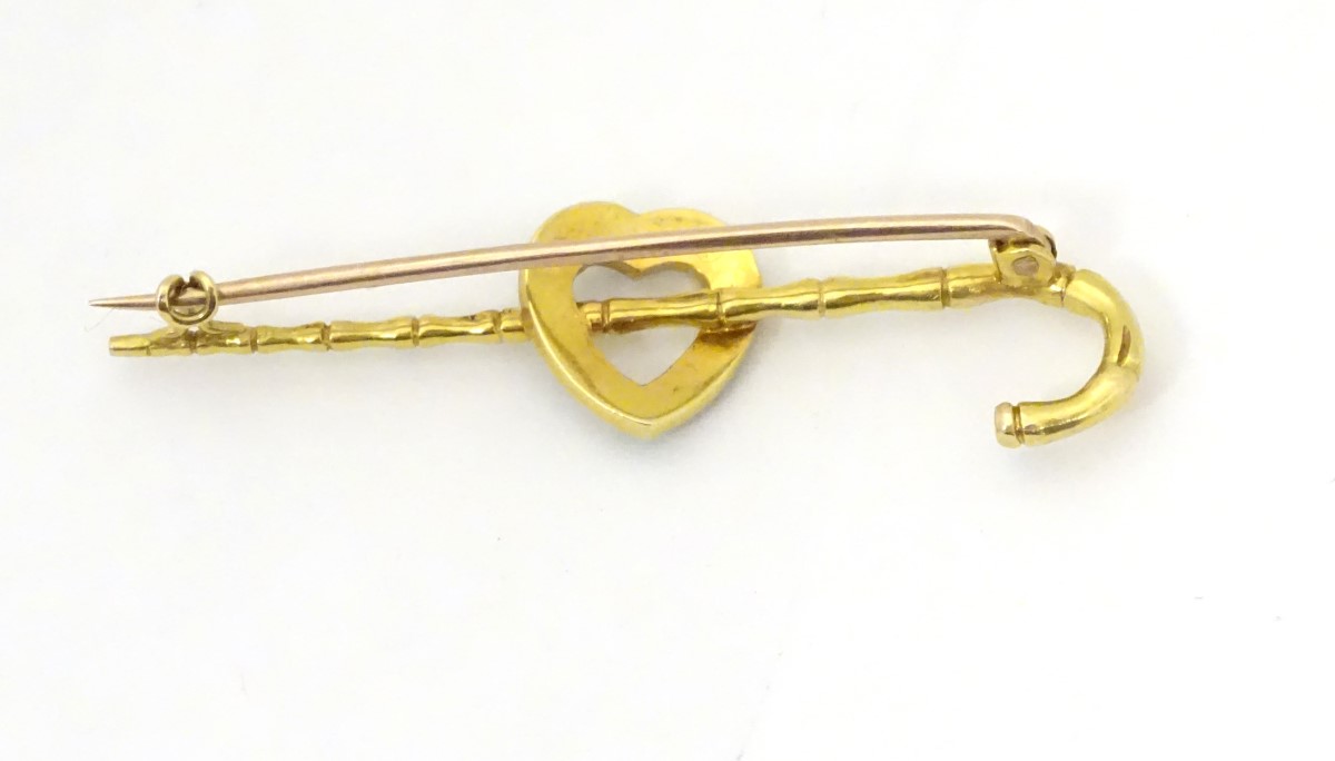 A gold bar brooch/ pin formed as a walking stick / cane with heart decoration set with seed pearl - Image 2 of 5