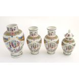 Four matching Japanese vases of various sizes, one lidded.