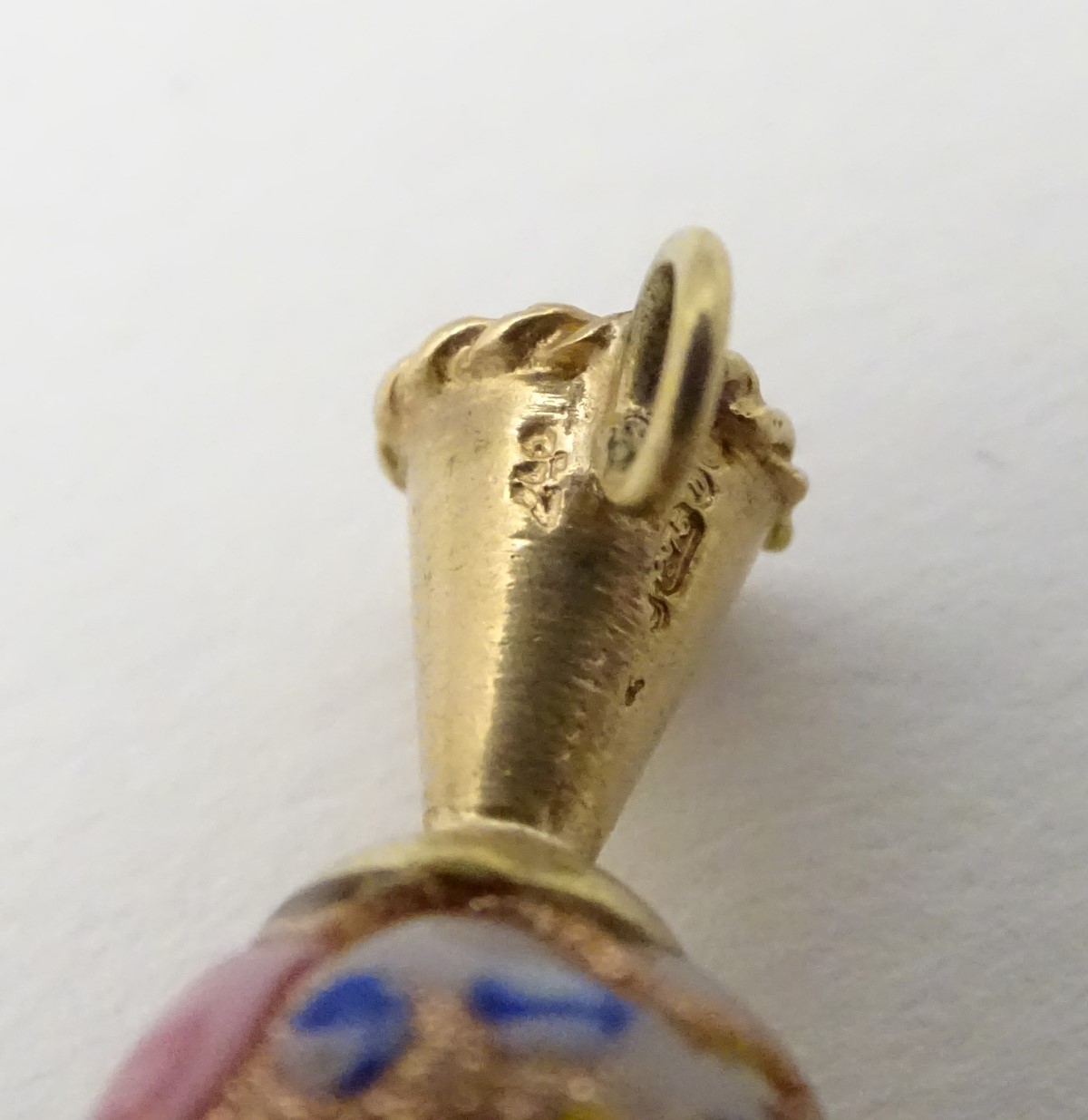 A 9ct gold charm formed as a ewer with a Venetian bead formed body. - Image 3 of 7