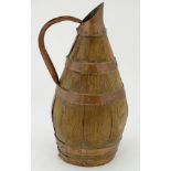 A French style oak cider barrel coopered in copper, with a copper spout and handle. Approx.