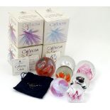 A collection of Caithness studio glass paperweights (four boxed), to include 'Starwatch',