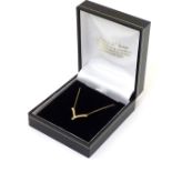 A 9ct gold pendant and chain, the pendant set with diamond.