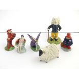 A quantity of assorted ceramic figurines, to include a Carlton Ware fairy and 'Mephisto' figure,