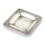 A silver pin dish of squared form hallmarked Sheffield 1899 maker W Harrison & Co.