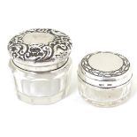Two cut glass dressing table pots / jars with silver tops, one hallmarked Birmingham 1898 ,