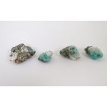 4 uncut emerald hardstones, the largest approx.