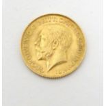 Coin: a 1915 half sovereign,