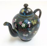 A 19thC small Oriental Cloisonne brass teapot with firebird and floral decoration.