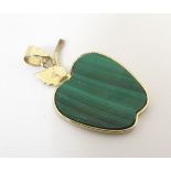 A silver gilt apple formed pendant set with malachite.