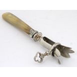 A late 19th / early 20thC French silver plate and horn manche a gigot (ham bone holder),