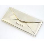 A novelty silver stamp case formed as an envelope hallmarked Birmingham 1988 maker Philip Kydd.