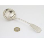 A Victorian silver fiddle pattern sauce ladle hallmarked Exeter 1848 maker Robert Williams & Sons.