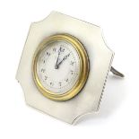 A clock / timepiece marked' 8 Days' with easel back and set within a silver Art Deco surround