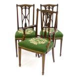 A set of three mahogany neoclassical dining chairs (2+1) produced by ‘Waring and Gillow’,