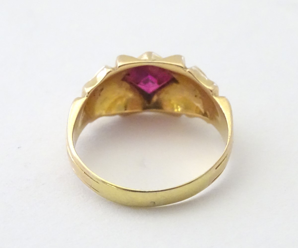 An 18ct gold ring set with central ruby in an Art Deco style setting. - Image 5 of 5